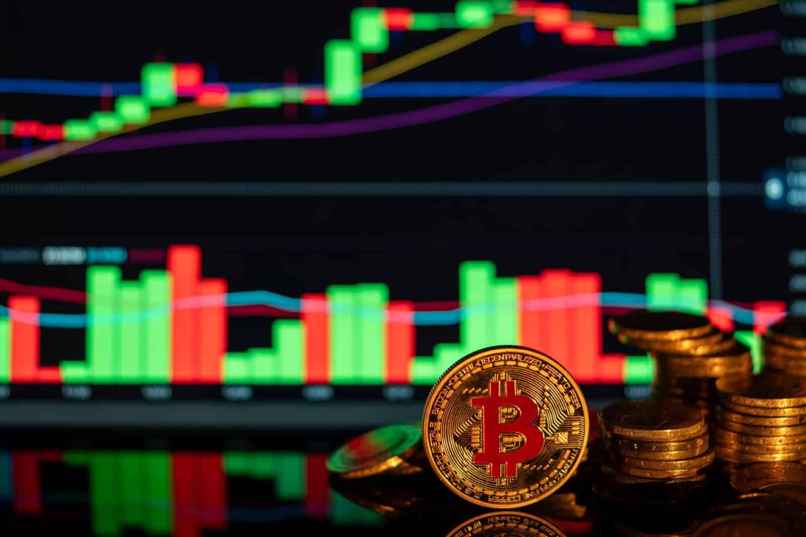 Close-up of Bitcoin coins against a rising financial graph, showcasing cryptocurrency market trends.