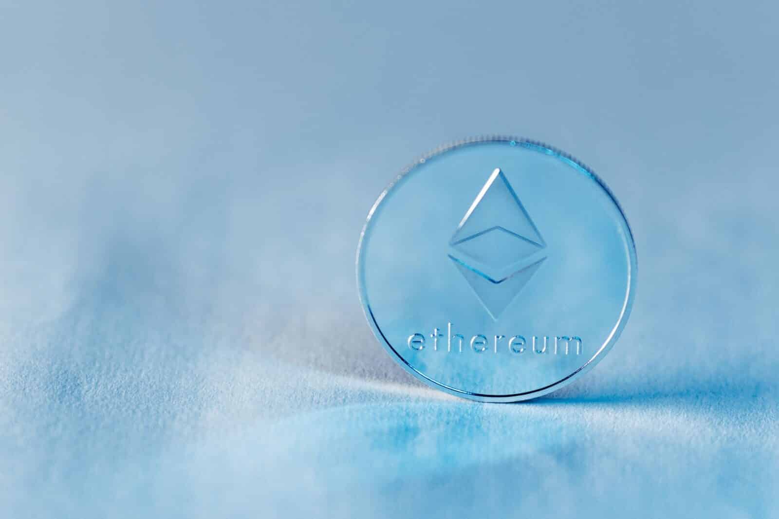 Close-up of a transparent Ethereum coin symbolizing blockchain technology and modern finance.