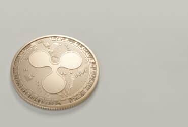 High-quality image of a Ripple (XRP) coin on a neutral backdrop, perfect for finance and cryptocurrency themes.