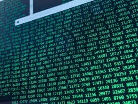 Vibrant green numbers on a computer screen, showcasing binary code and data streams.